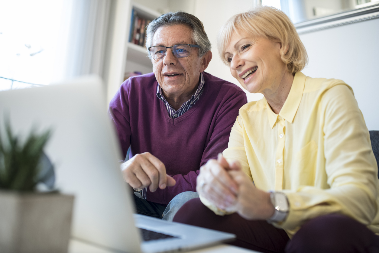 Older couple researching types of senior living in New Jersey