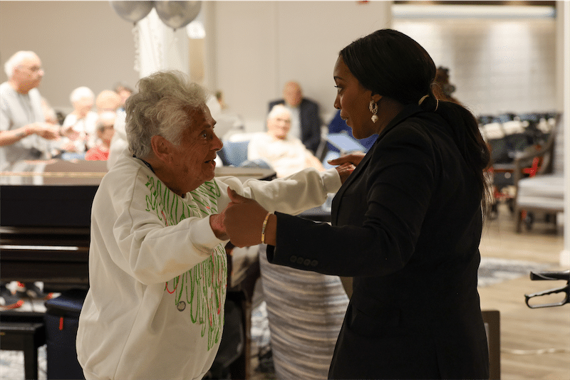 Seniors dancing together at a community event